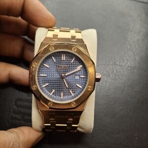 Gold Men's Wristwatch with Blue Dial —